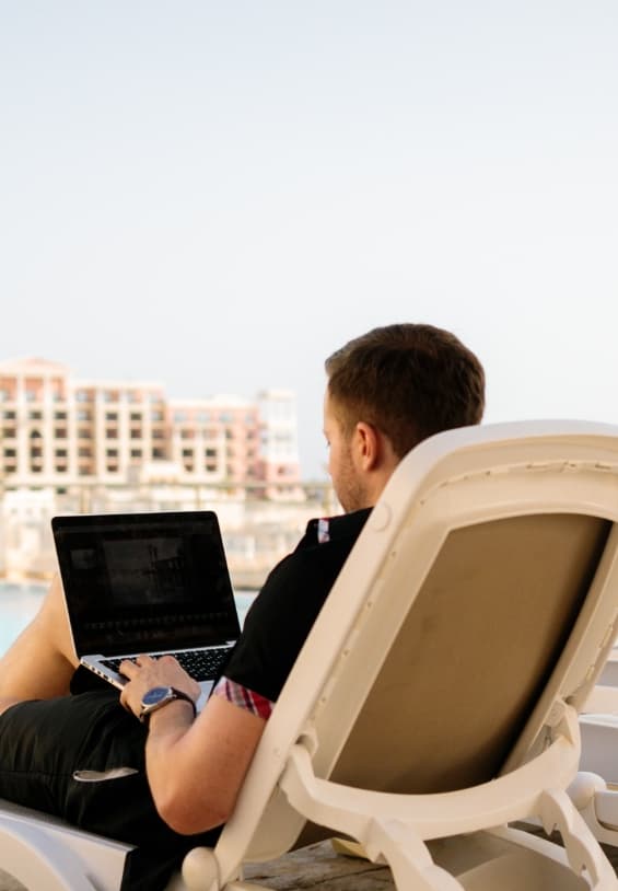 An image with deckchair laptop