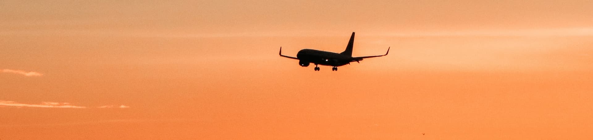 An image with plane sunset